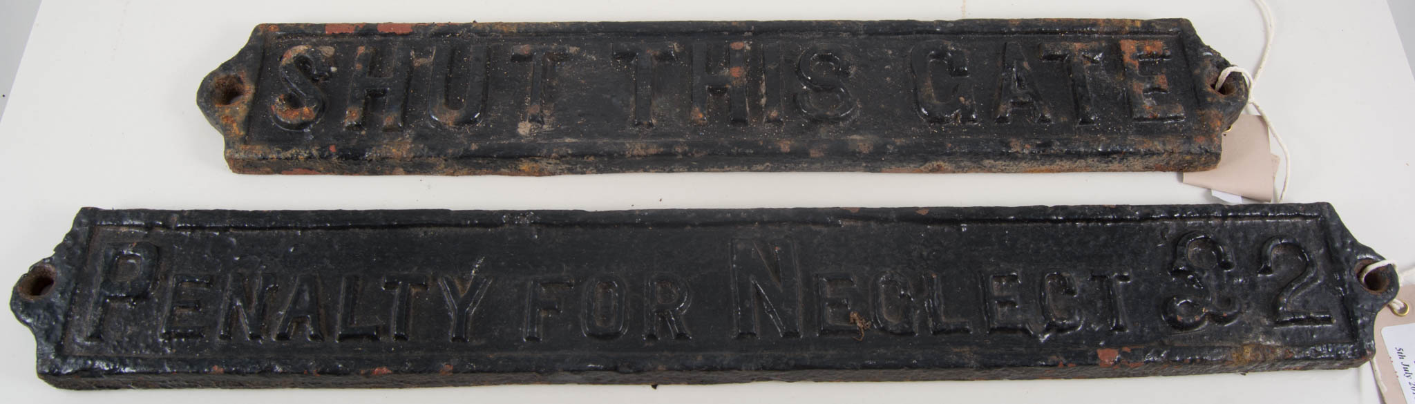 Two cast iron Railway signs, "Shut the Gate", and "Penalty for Neglect £2.00", 53cms.