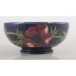 Moorcroft bowl, anemones on a dark blue ground, diameter 16cm.