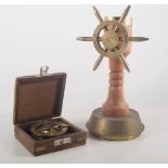 Re-cast brass sextant, another boxed compass, table compass, gimballed led compass.