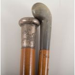 Malacca walking cane, with a Chinese white metal pommel, 21cms, another cane with a horn handle,