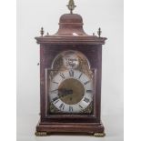 Victorian style mahogany bracket clock, pagoda top, arched brass dial with cast spandrels,