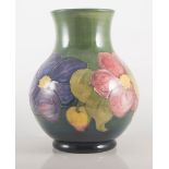 Moorcroft vase, "Anemone" design, green ground, 25cms.