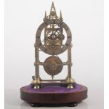 Victorian Brass Skeleton Clock, silvered chaptering with Roman numerals, stained wood oval bass,