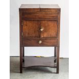 Late Georgian mahogany wash stand, hinged top above a cupboard, legs joined by a shelf, width 49cms.