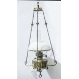 Late Victorian hanging brass oil lamp, scrolled frame, opaque shade, approximately 100cms.