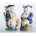 Staffordshire toby jug, Mr Toby seated, height 23cms, and another toby jug, (2).