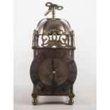 Modern brass cased lantern clock, pierced top, circular chapter ring with Roman numerals,