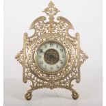 Brass framed mantel clock, circular dial, height 30cms.