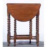 Small oak gateleg table, oval top with moulded edge and two fall leaves, barley twist legs,