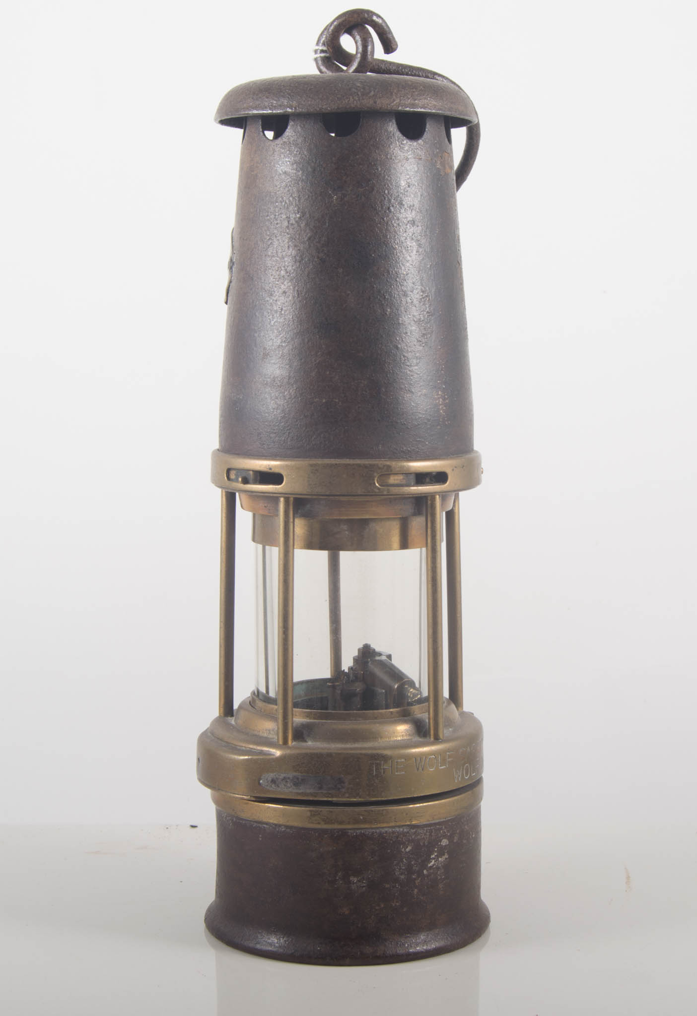 A Miner's lamp, GMEF, stamped Sheffield, height 29cms.