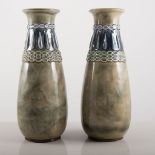 Pair of Royal Doulton stoneware vases, 20cms.