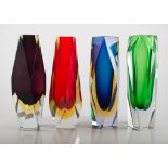 Four contemporary glass vases, prismatic design, individually in red, green, blue and purple,