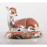 Royal Crown Derby paperweight, of a Fallow Deer, seated,