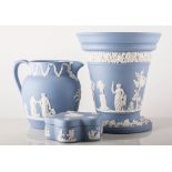 Approximately thirty-seven pieces of Wedgewood pale blue Jasperware, including lamp.