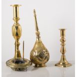 Brass Corinthian column lamp, brass candlesticks, and a Mamod steam engine.