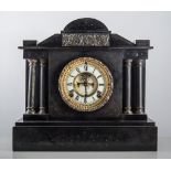 American black marble mantel clock, architectural case with a shaped pediment, ivorine chapter ring,
