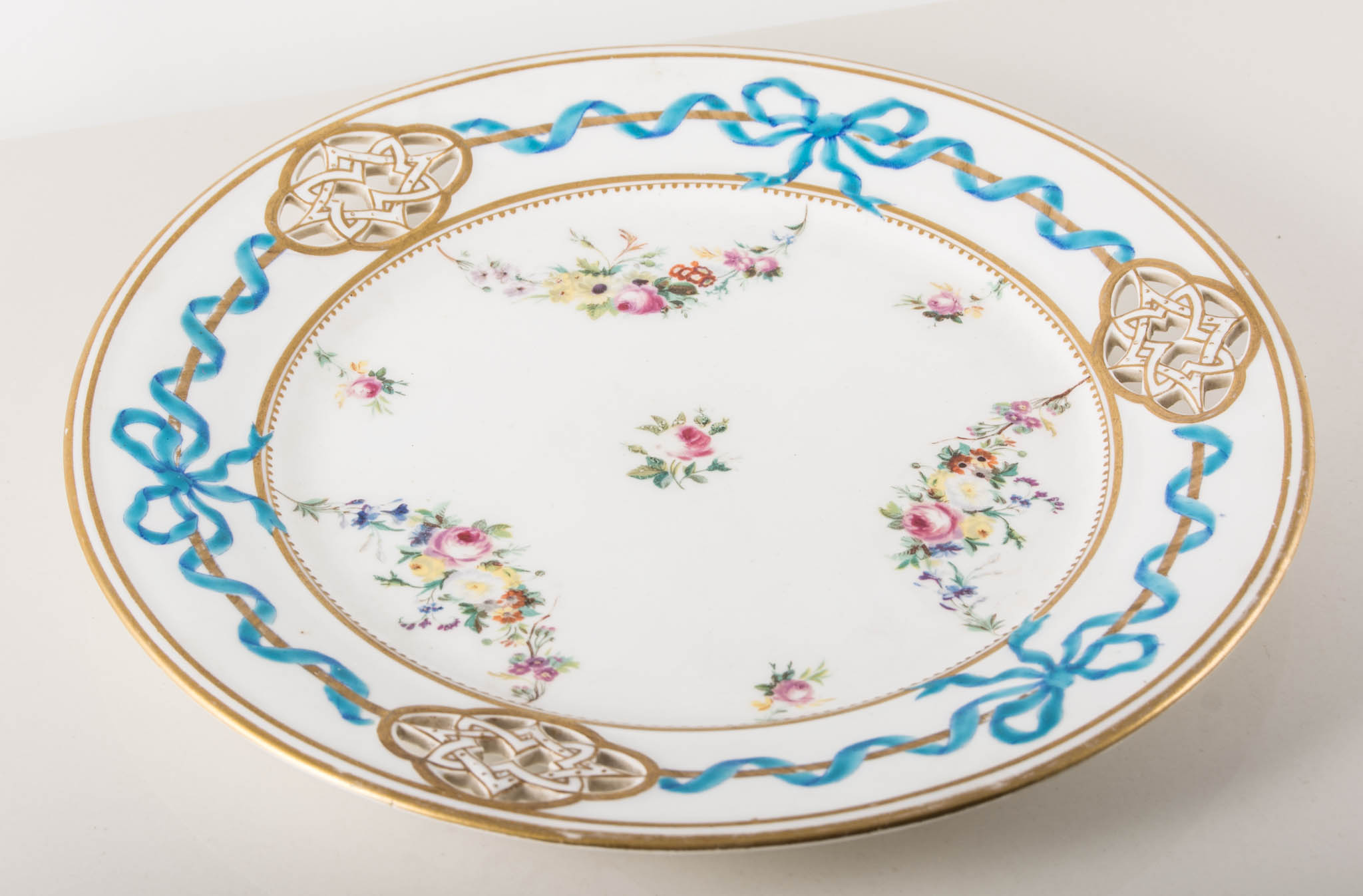 Victorian bone china dessert plate, by Copeland, circa 1880, pierced rim with gilt detailing,