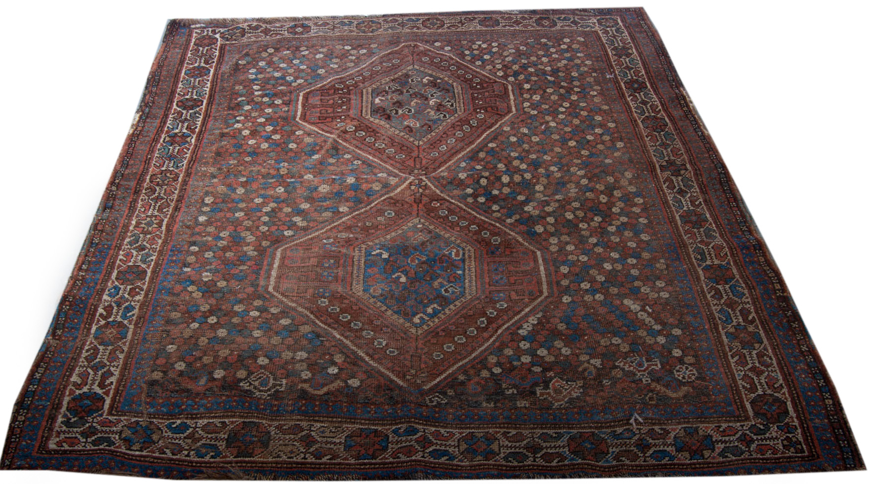 Hamadan bordered rug, two central hexagons multi floret ground,