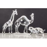 Swarovski Crystal, four African Wildlife series figures; including Cheetah (high tail), Leopard,