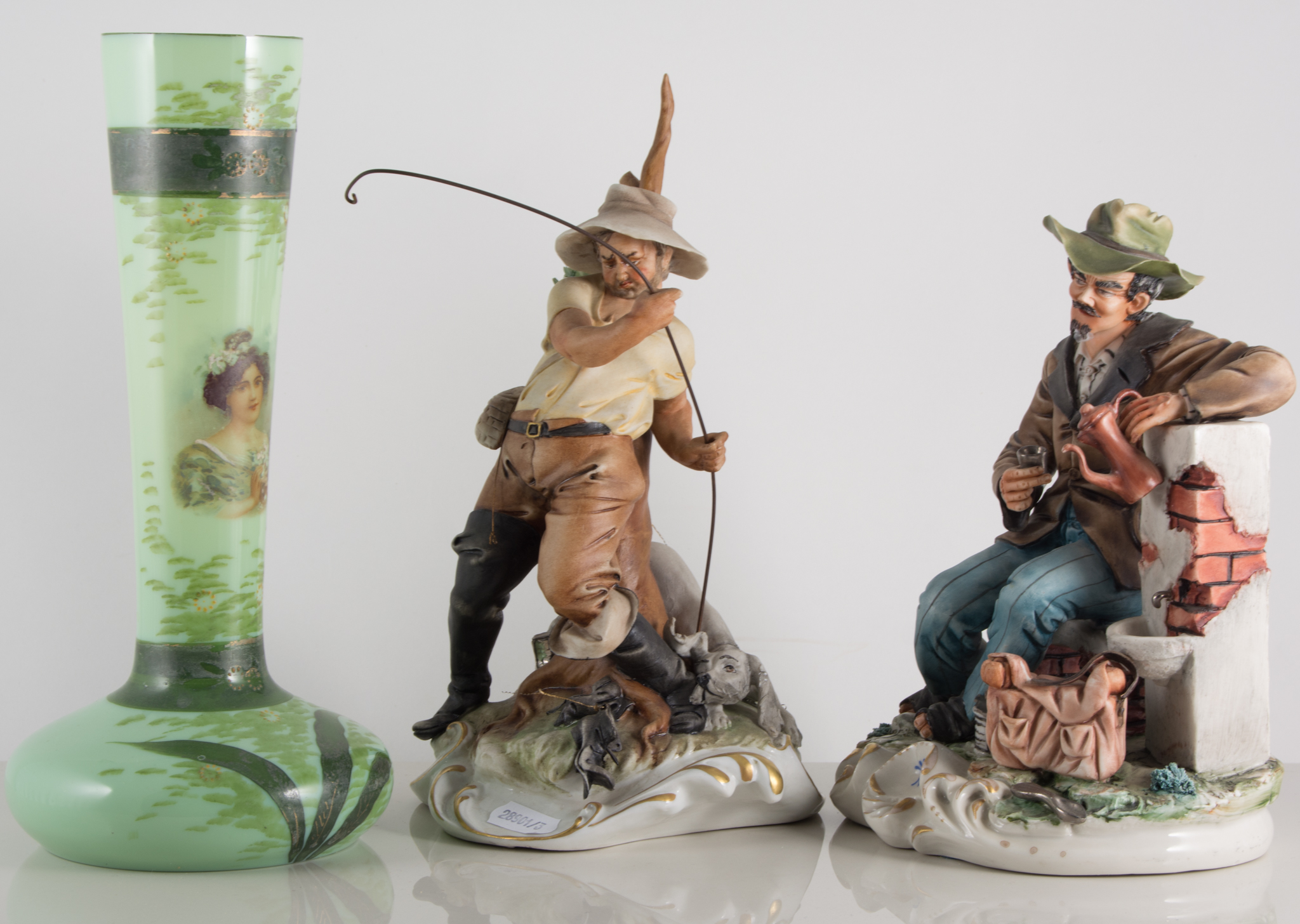 Three Capodimonte figures and two opaque glass Victorian vases.