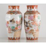 Pair of Kutani style baluster-shaped vases, decorated with birds amongst flowers and foliage, 28cm.