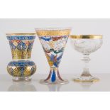 Venetian style enamelled soda glass beaker, 14cm, another beaker and a Bohemian champagne, (3).