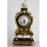 An Imperial lacquered mantel clock, on stand, together with another mantel clock with painted case,