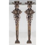 Pair of French bronze figurines, wall mounted, height 81cm, maximum width 18cm.