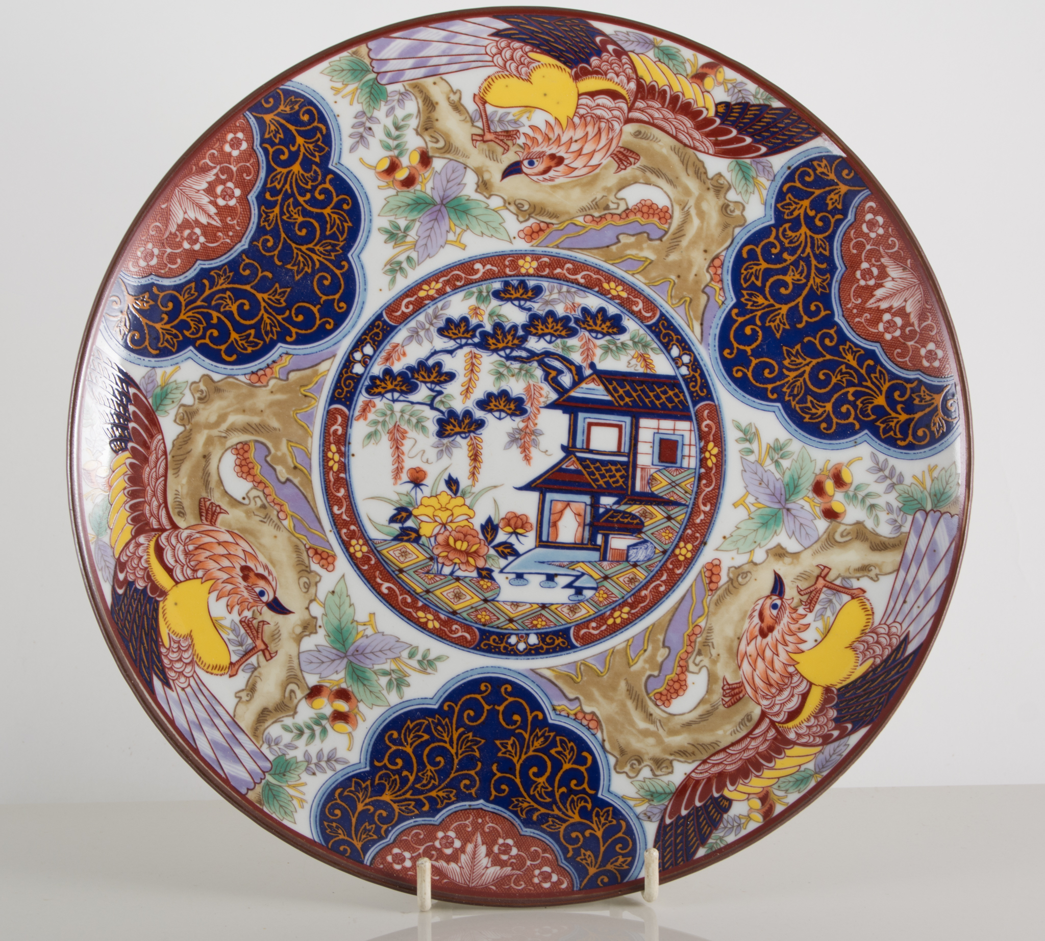 Chinese polychrome dish, shallow circular form, decorated with women by a riverside, restored,