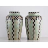 Pair of Royal Doulton Lambeth stoneware vases, tubelined with geometric and chevron banding,