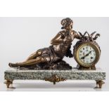 A French three piece clock garniture, gilt metal on marble bases,