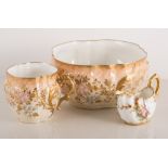 Early 20th century peach ground floral tea service, floral decoration with gilt highlights, 12 cups,