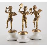 Three cast gilt bronze musical cherubs, 24cm, (3).