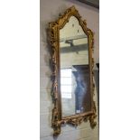 Gilt framed wall mirror.