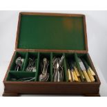 A mahogany canteen of nickel cutlery and knives, oak box of EPNS crested spoons,