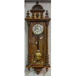 Walnut cased Vienna wall clock, architectural pediment, enamel dial, spring driven movement, 140cm.