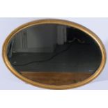 Oval gilt framed wall mirror,bevelled plate 96 x 66cm, and a mahogany framed wall mirror.