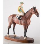 Beswick "Nijinsky, Lester Piggott Up" on an oval wooden base with plaque (missing reins), 32cm.