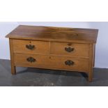 Oval gilt framed wall mirror and a three drawer low chest.