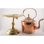 Victorian copper kettle, 35cm and a pair of brass pedestal trivets, (3).