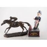 Painted metal money box Uncle Sam 29cm, two resin racehorses, and two pewter models (5).