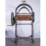 A vintage iron mangle, CWS,Ironworks, Keightley, height 148cm.
