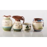 Collection of Torquay Motto ware pottery, slip decorated, (1 box).