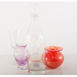 Three glass spirit decanters, and other glassware.