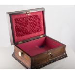 A rosewood sewing box inlaid with mother-of-pearl, concave sides and stepped lid, egg bead border,