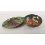 Moorcroft green ground bowl, Hibiscus design and a Moorcroft ashtray,