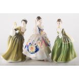 Four Royal Doulton figurines, "Christine" H.N. 2792, "Fragrance" H.N. 2334, "Fleur" H.N.