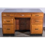 Mahogany seven drawer kneehole desk, inset top, circa, 1950.