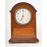An Edwardian inlaid mahogany mantle clock, white enamelled dial, cylinder movement, 23cm.