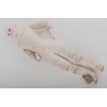 French bisque head and leather bodied doll, 39cm.